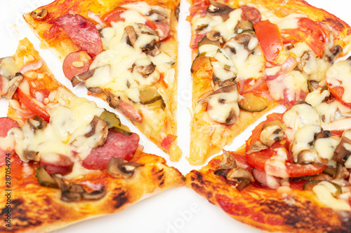 Pieces of Italian pizza, top view, the concept of traditional Italian cuisine