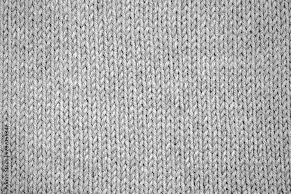 Knitting pattern Knitted seamless background in gray. Knit textures for wallpapers and backgrounds. Knitting pattern Knitted seamless background in gray. Knit textures for wallpapers and backgrounds.