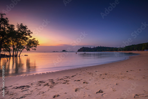 Wonderful Sunset moment at Pelawan beach karimun Indonesia photo