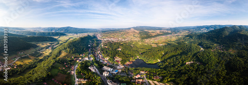 Aerial panoramic drone shot of Sovata city with Ursu Lake © frimufilms