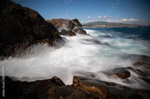 waves breaking on the rocks