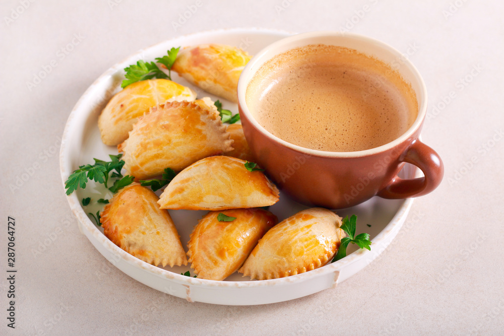 Savory hand pies on plate Savory hand pies on plate