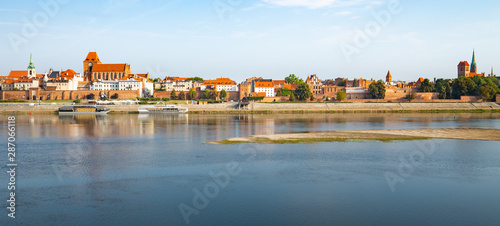 Torun. View from behind the Vistula River to the old medieval city walls and architecture