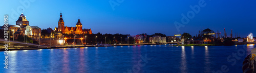 Szczecin. A night panorama of the city located on the banks of the Odra River photo
