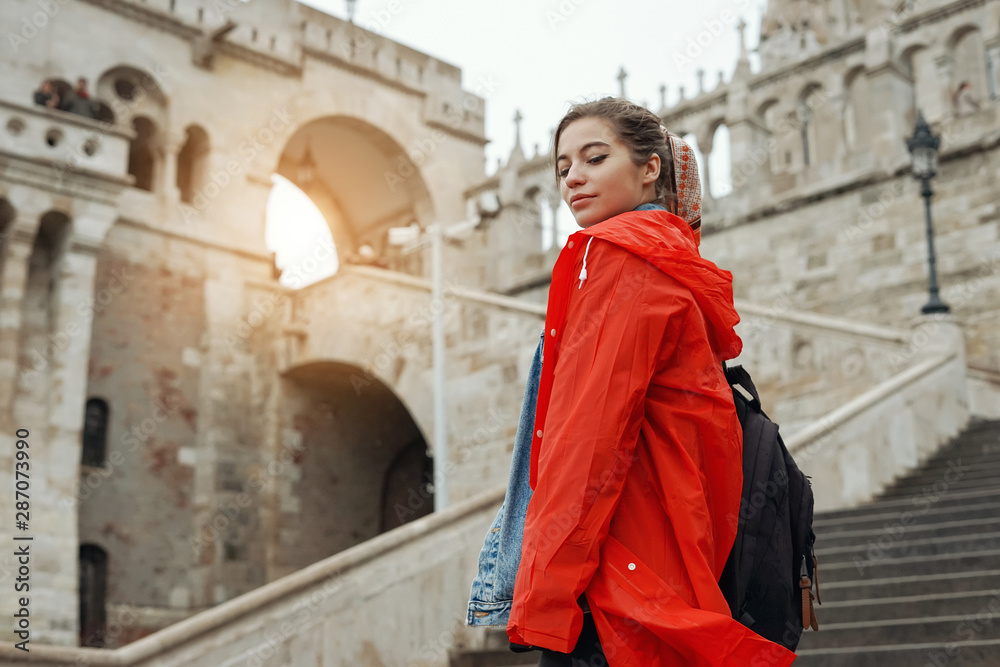 Young woman with blonde hair in the Fisherman's Bastion in the Castle district of Budapest