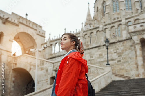 Young woman with blonde hair in the Fisherman's Bastion in the Castle district of Budapest © Kseniia