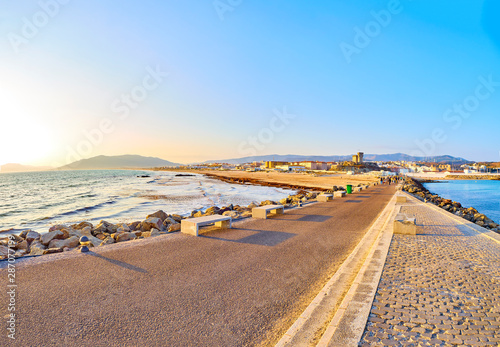 Fotografie Playa de Los Lances Beach, the Southernmost Point of Continental Europe, with Santa Catalina Castle in the foreground
