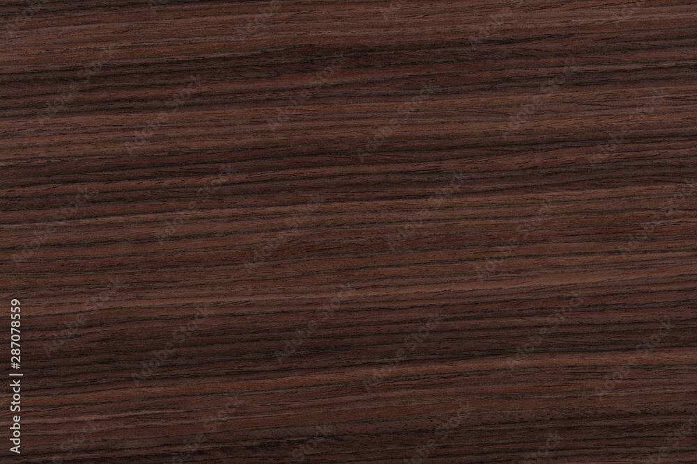Contrast rosewood veneer background in dark color. High quality Contrast rosewood veneer background in dark color. High quality