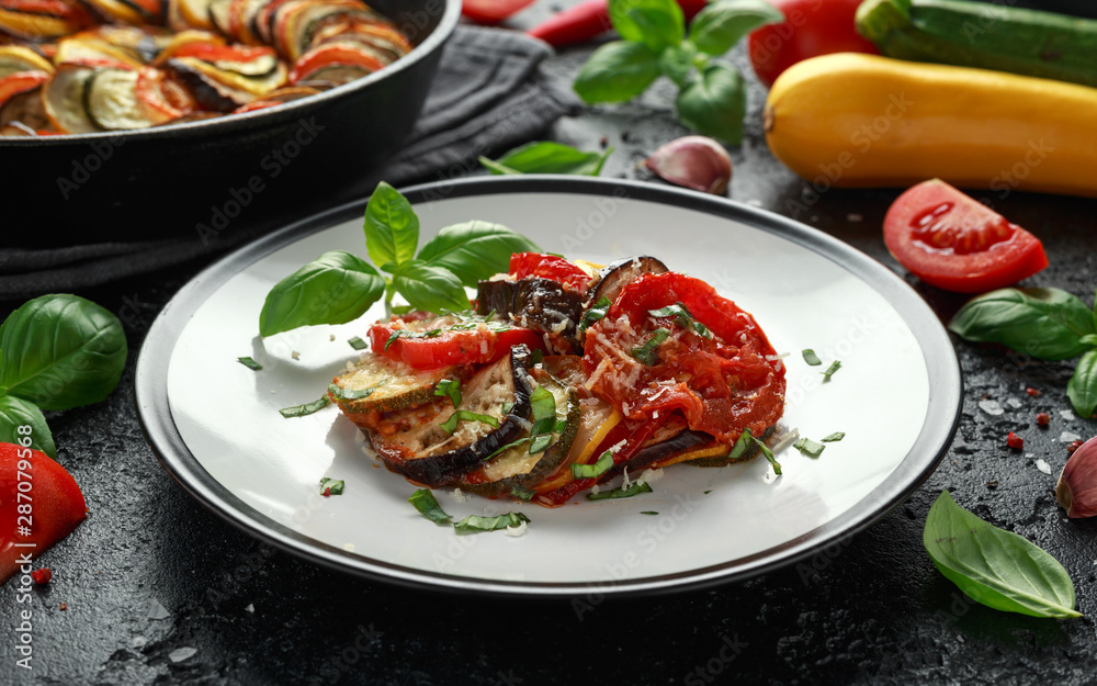 Ratatouille Vegetable Stew with zucchini, eggplants, tomatoes, garlic, onion and basil. Traditional French food.