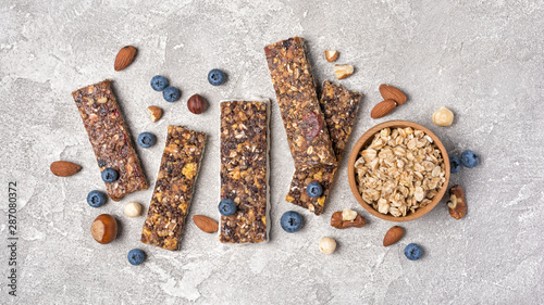 Granola bar with fresh blueberry and nuts for healthy nutrition