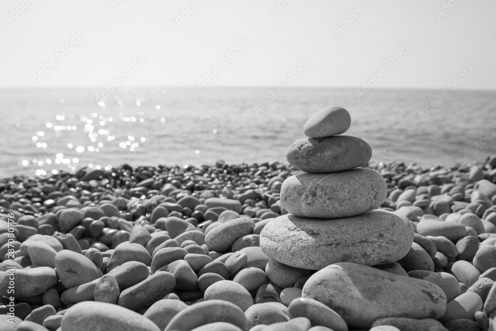 Naklejka Stones on the beach on spanish coast city