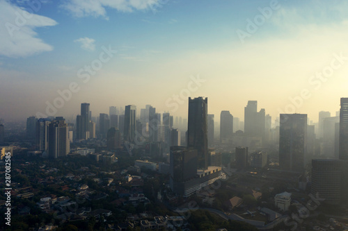 Jakarta city with air polluted at dawning time