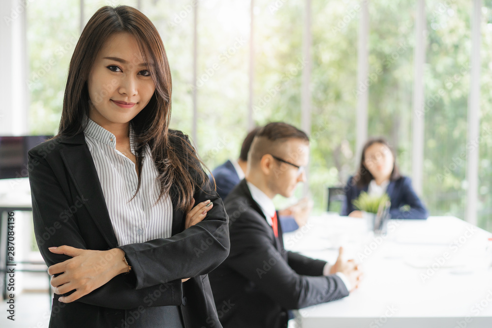 portrait of asian business woman in company meeting room. portrait of asian business woman in company meeting room.