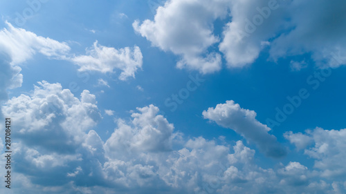 White Clouds Floating in the Bright Blue Skies