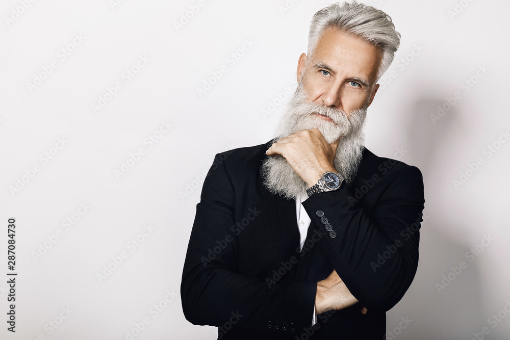 Handsome aged man wearing stylish black suit Handsome aged man wearing stylish black suit