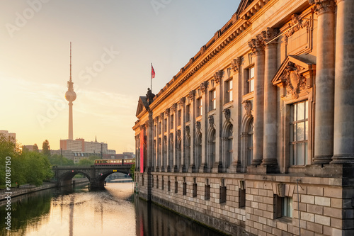 Museum Island on Spree river and tower at background at sunrise in Berlin photo