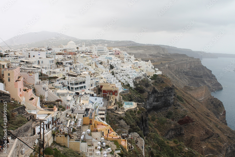 City fira in Santorini, Greece with white building on a mountain