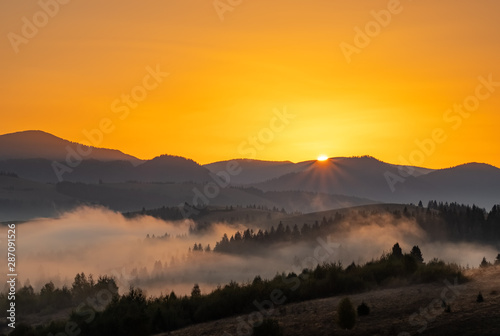 Beautiful autumn landscape at sunrise g in Carpathian mountains, Ukraine