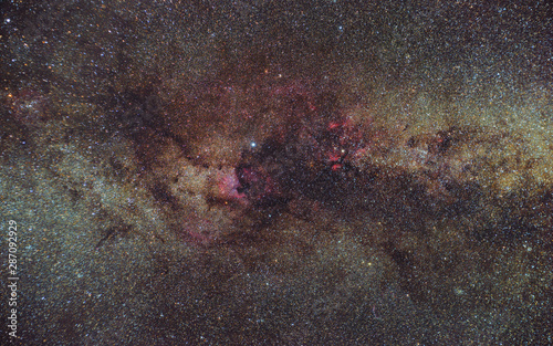 Night telescope photography of Cygnus nebulae in the Milky Way galaxy