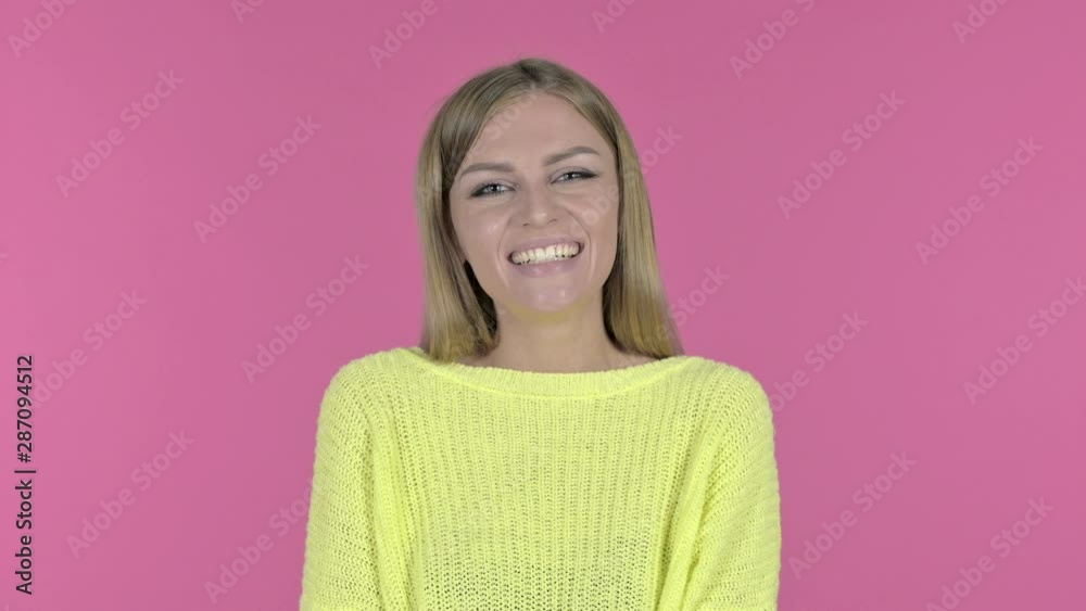 Cheerful Young Woman Laughing, Pink Background Cheerful Young Woman Laughing, Pink Background