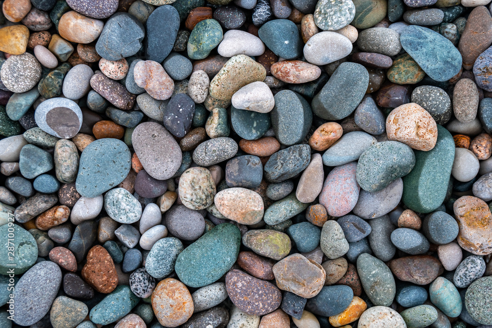 Close up of rounded and polished beach rocks. Close up of rounded and polished beach rocks.