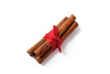 cinnamin sticks wrapped in red ribbon