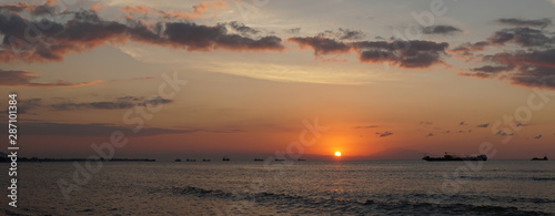 Sunset over the beach at Cape Fatucama in Dili, East Timor. photo