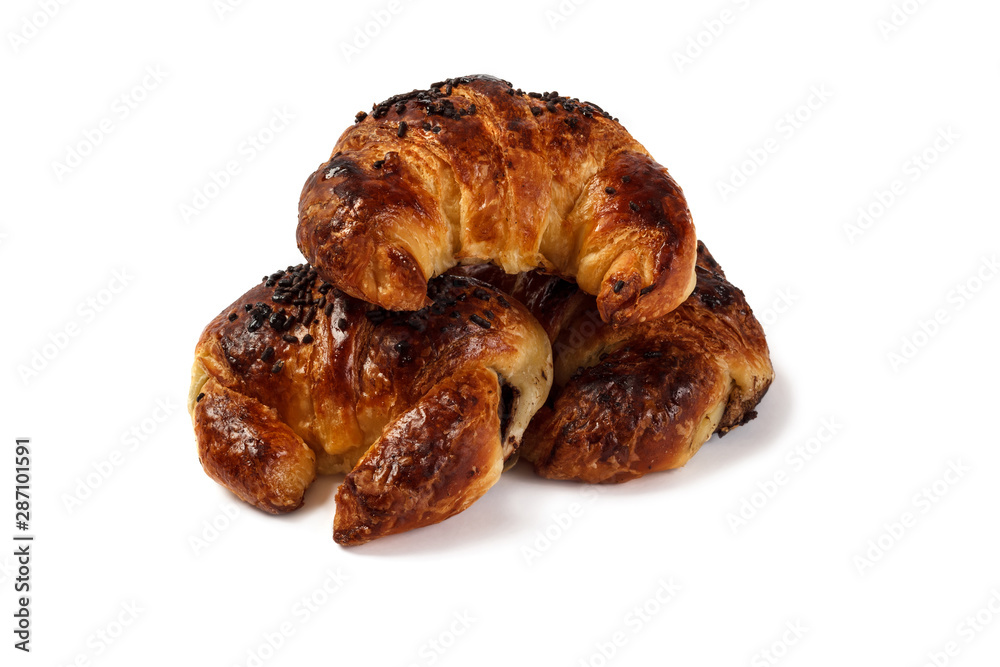 stack of three chocolate croissants isolated on white background stack of three chocolate croissants isolated on white background
