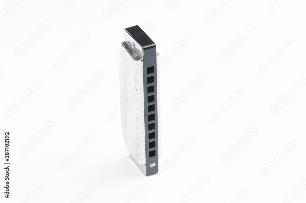 Mouth organ isolated on white background.Harmonica.Copy space Mouth organ isolated on white background.Harmonica.Copy space