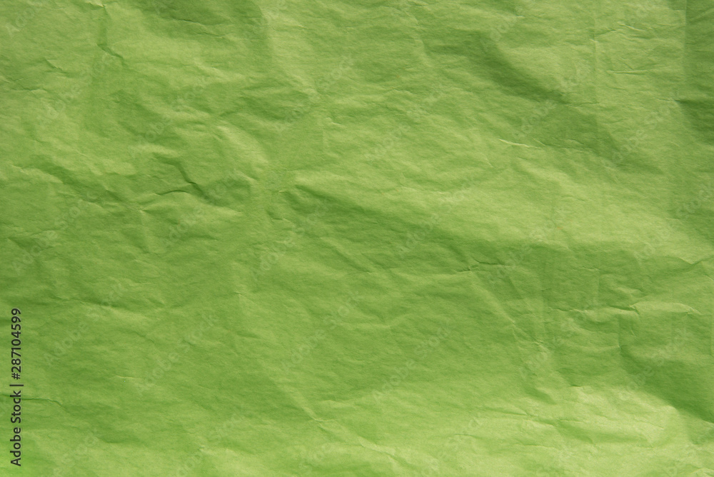 Fototapeta premium green creased paper texture background