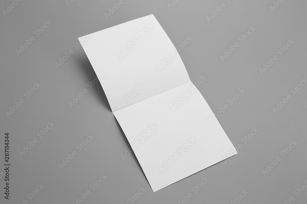 Blank portrait mock-up paper. brochure magazine isolated on gray, changeable background / white paper isolated on gray Blank portrait mock-up paper. brochure magazine isolated on gray, changeable background / white paper isolated on gray