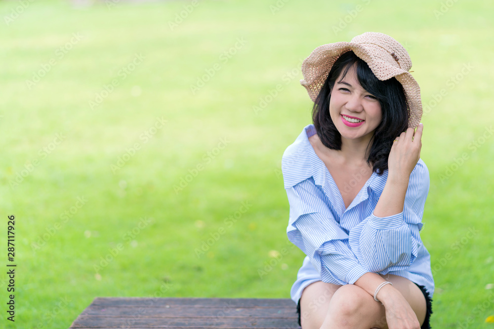 Beautiful young smiling woman outdoor in the park Beautiful young smiling woman outdoor in the park