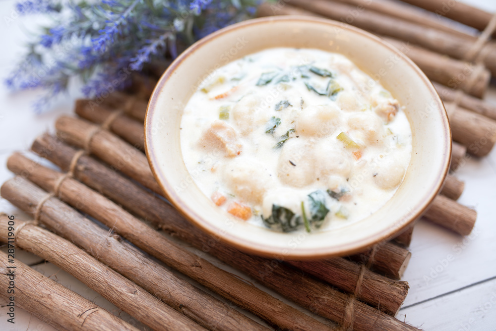 Traditional Italian chicken gnocchi soup in a bowl Traditional Italian chicken gnocchi soup in a bowl