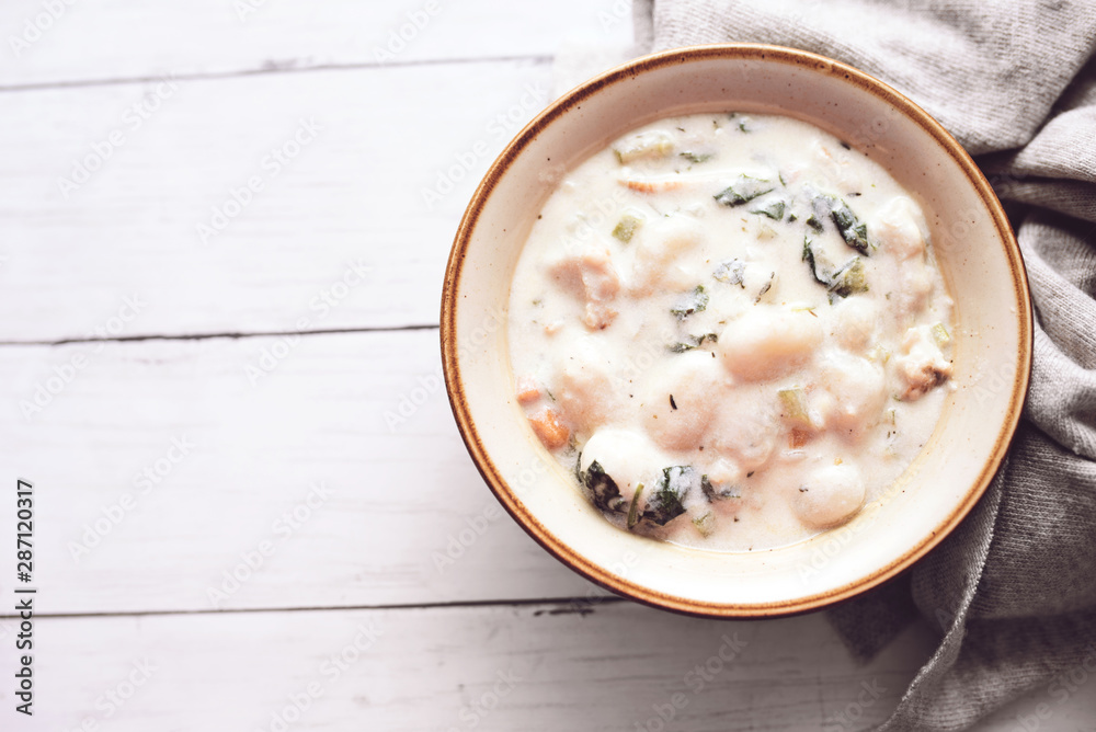 Traditional Italian chicken gnocchi soup in a bowl Traditional Italian chicken gnocchi soup in a bowl