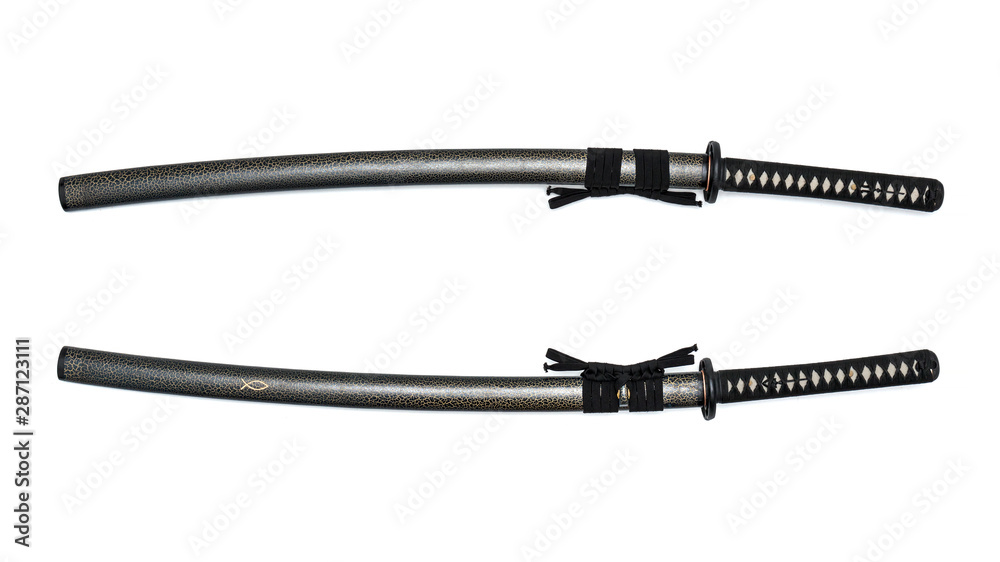 Red blade Japanese sword black cord with full textured scabbard isolated in white background. Red blade Japanese sword black cord with full textured scabbard isolated in white background.