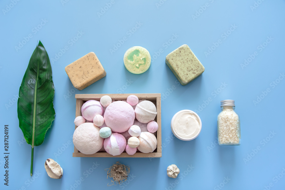 Spa composition with body care items on a colored background Spa composition with body care items on a colored background