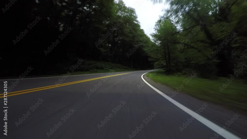 Faint Headlights on Road at Low Angle Faint Headlights on Road at Low Angle