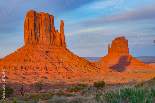 Colorful Sunset and Glowing Red Rock Features in Monument Valley