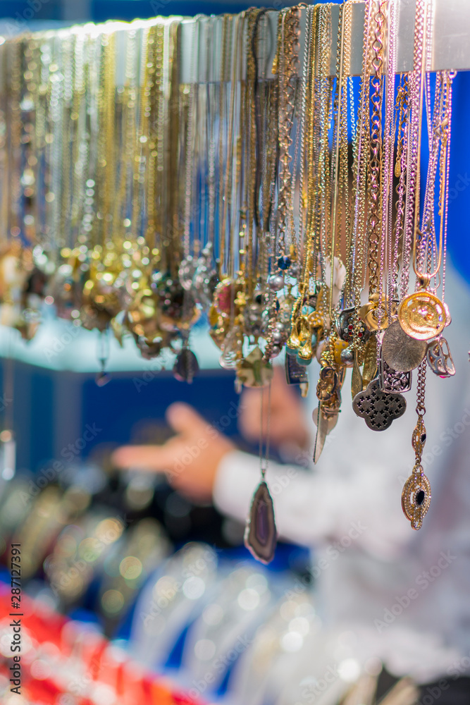 Jewelry store in Grand Bazaar. Gold jewelry in the oriental bazaar. vertical photo