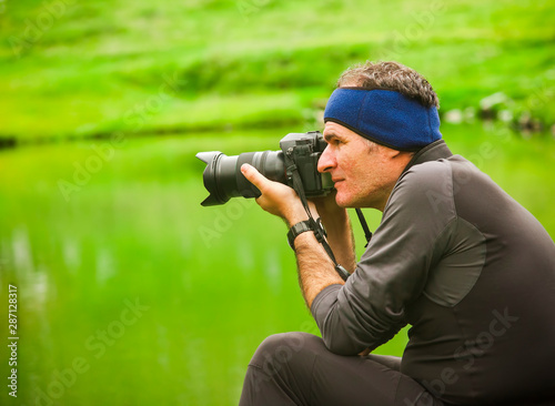 photographer taking photos with professional camera