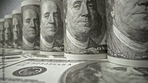 American one hundred dollar paper banknote in close up macro view dolly shot. Concept of finance and economy.