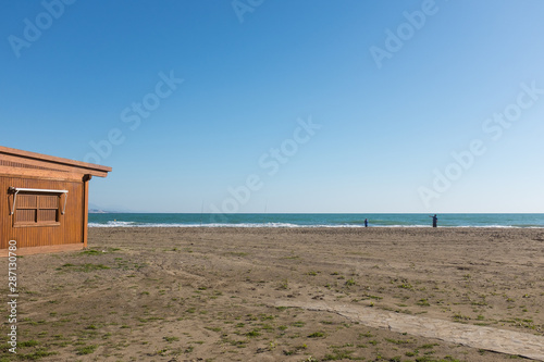 landscape of a malaga beach with people silhouette © ANTONIO