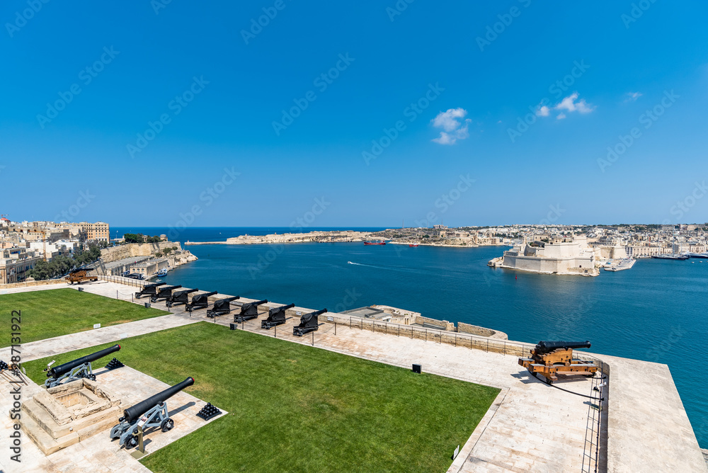 Valletta Malta July 27 2017 The view of the Grand Harbour (Port of Valletta) with the canon battery fortification
