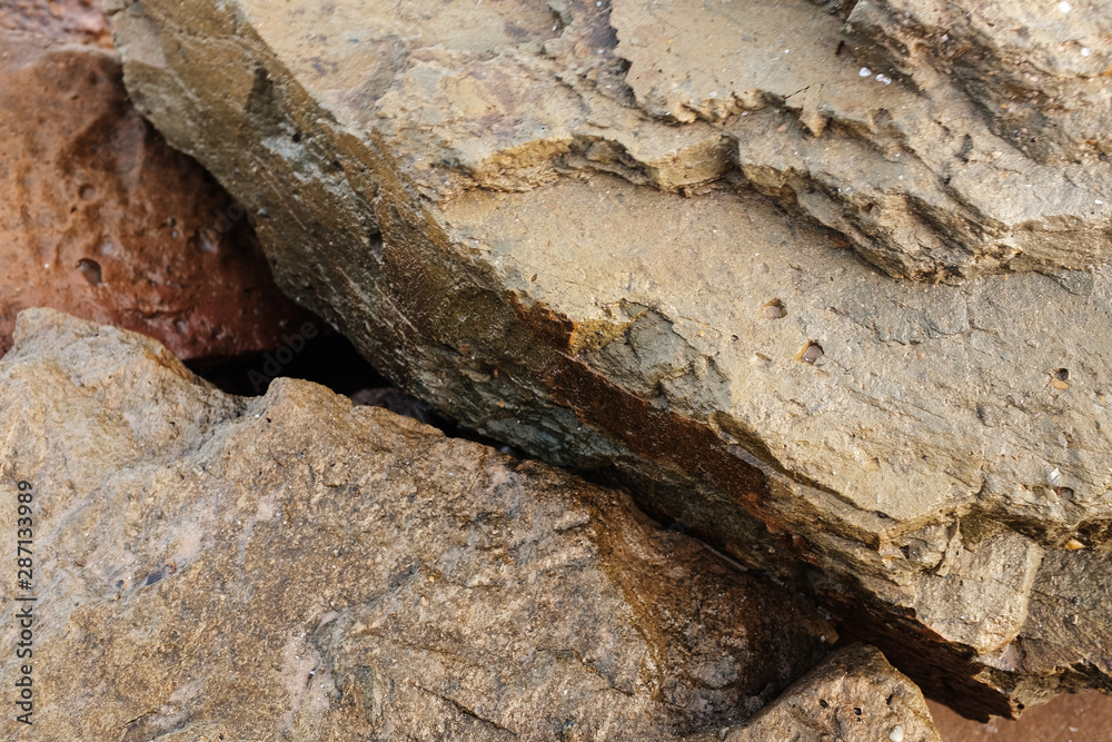 The close-up relief of the rocks.rock background The close-up relief of the rocks.rock background