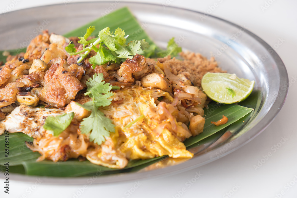 Fried mussel pancakes and Pad Thai in dish Fried mussel pancakes and Pad Thai in dish