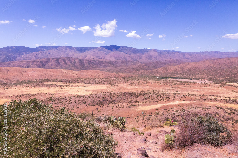 A favorite rest stop with a desert landscape view off the I17 heading north out of Phoenix, Arizona has subtle hues, rolling hills and mountain views in this scenic rest stop
