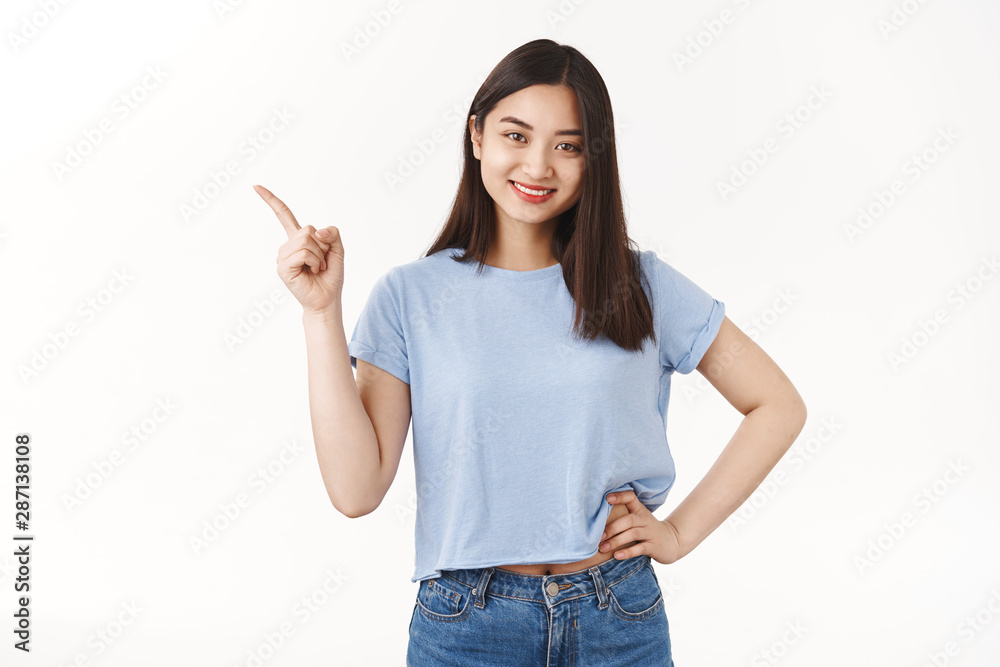 Cheerful confident lively pretty brunette asian girl give advice suggest cool link teaching self-acceptance pointing upper left corner tell where find cheap holiday agency smiling broadly Cheerful confident lively pretty brunette asian girl give advice suggest cool link teaching self-acceptance pointing upper left corner tell where find cheap holiday agency smiling broadly