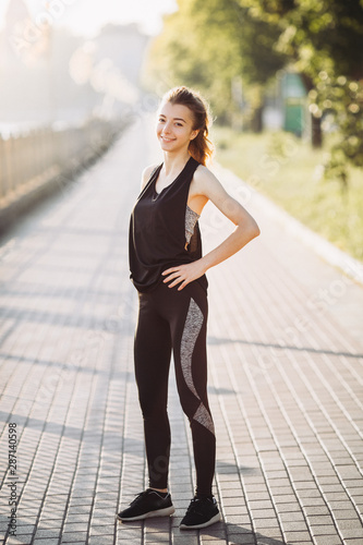 Young girl jogging in the early morning © dsheremeta