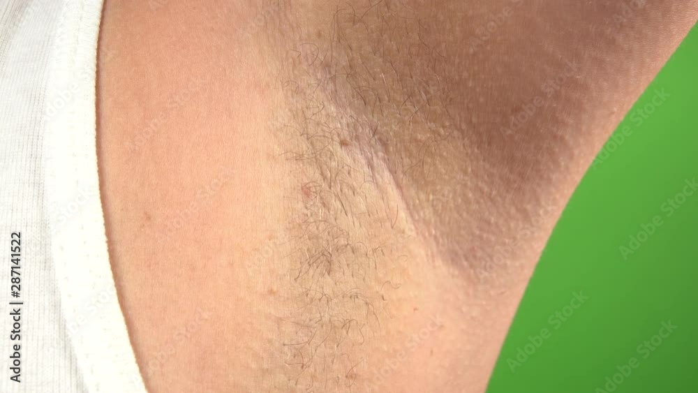 Closeup view of female armpit with hair growing. Modern trand of natural beauty concept. Real time 4k video footage. Closeup view of female armpit with hair growing. Modern trand of natural beauty concept. Real time 4k video footage.