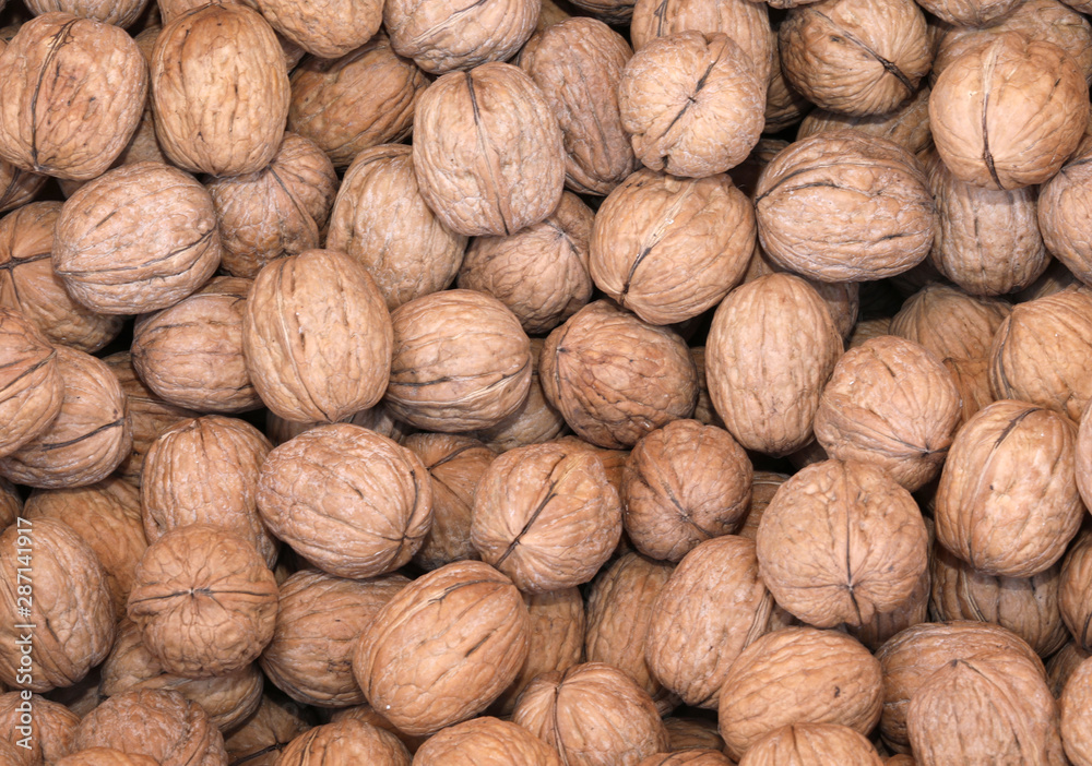 background of organic walnuts background of organic walnuts